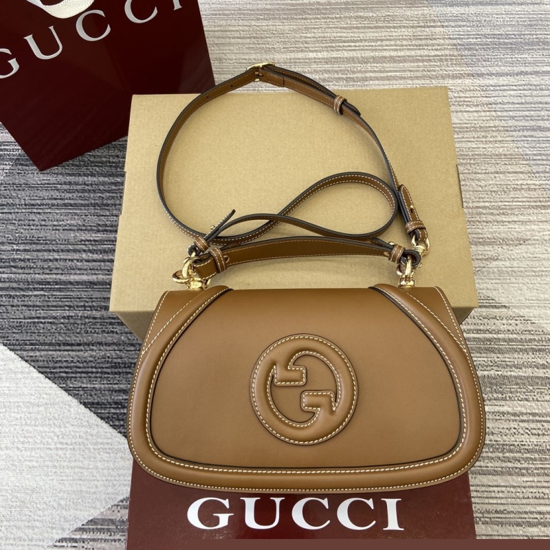 G*u*i top handle bags